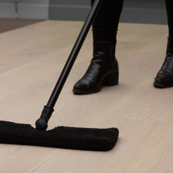 Use one side of the mop cover to remove dirt 