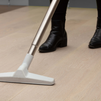 sweep or vacuum the entire floor surface